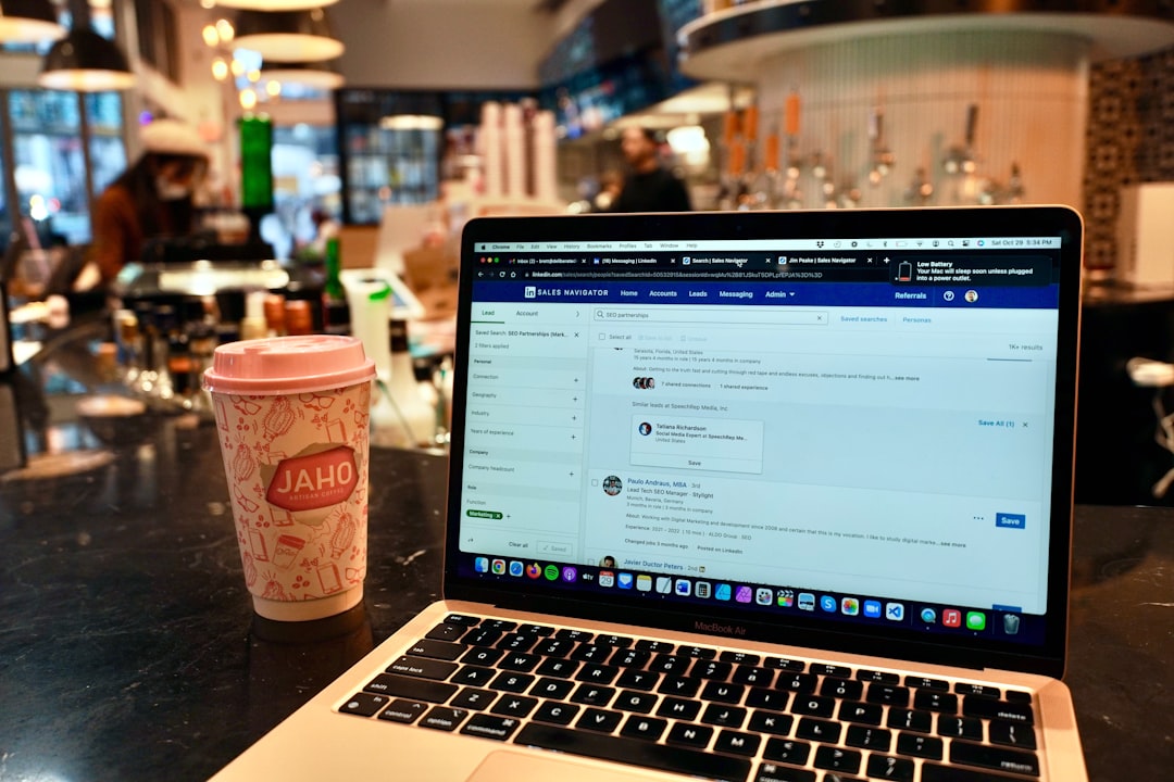a-laptop-computer-sitting-on-top-of-a-table-zdlu0dre0wi